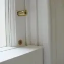 Sash stop locks