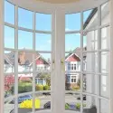 Curved timber casement window Spoon End fittings